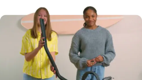 Curriculum Innovation image 29 (name women with vaccuum)